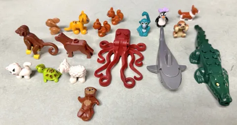 LEGO animals lot: alligator, shark, octopus, dog, squirrels, turtle, 17 toys