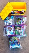 Legos in Yellow Lego storage brick box-5 sets 41100, 41119, 41124, 41300, 41323