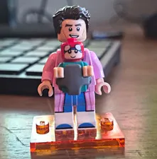 LEGO Minifigures Minifigure Black Hair Pink Jacket Outfit Holding Baby