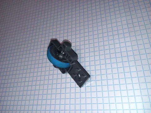 1 Lego Assembly Flywheel Plate 2 by 8 with Metal Flywheel and Dark Azure Tire