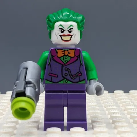 Lego Super Heroes The Joker - Orange Bow Tie, Green Arms Minifigure sh0590