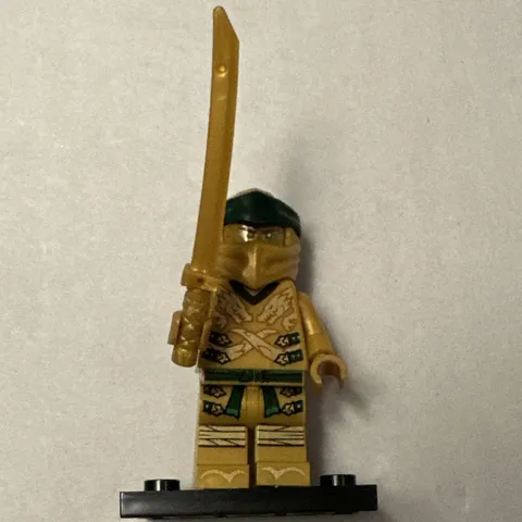 NINJAGO: LEGO Gold & Green Minifigure w/ Gold Sword Back Accessory Green Hair