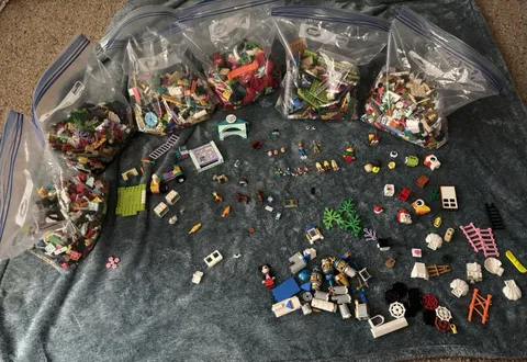 Legos Mixed Lot Featuring Disney, Vet Clinic, And Roses