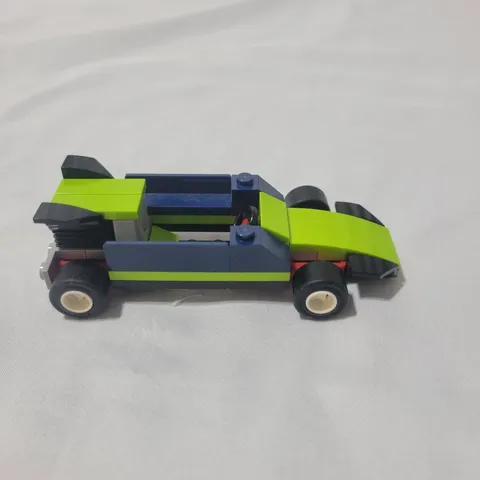 Lego blue and lime green race car from the LEGO City Race Car(30640)