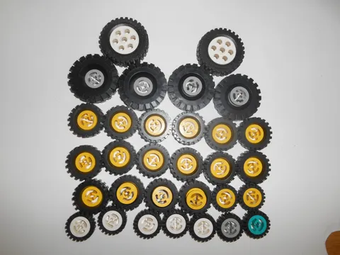 Vintage Lego Wheels with Split Axle Hole, Offset Tread Tires Lot