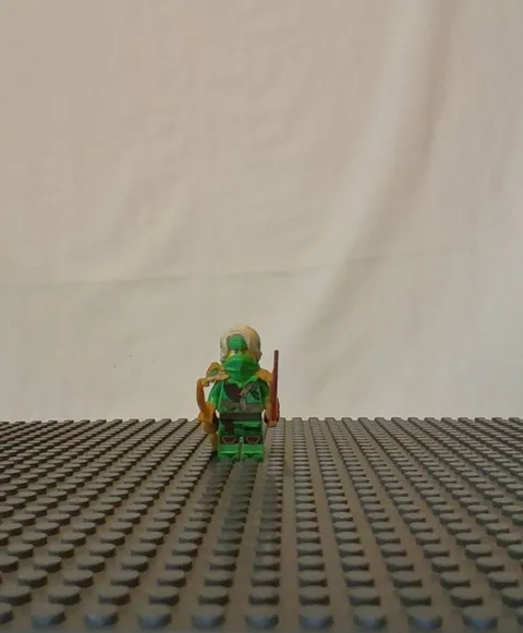 Ninjago minifugure 71842 dragons rising 2025 with a reveal blade