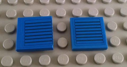 LEGO Lot of 2 Blue 2x2 Tiles with Black Vent Sticker Pattern from 3181