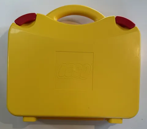 Yellow plastic LEGO carrying case with handle and red latches