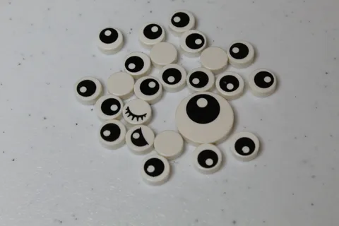 LEGO Numerous Animal Eyes 1x1 Round Tiles and one 2x2 Eye tile