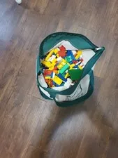 Lego bag, large assortment of building bricks, wheels, etc