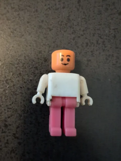 Vintage lego figurine mini figurine pink legs white top no hat or hair