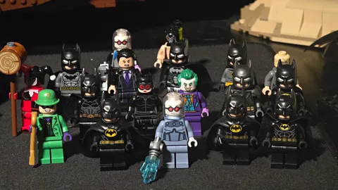 LEGO Batman minifigure lot and batmobiles.