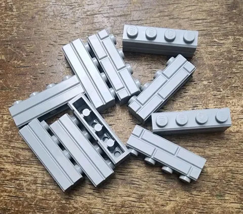 LEGO Light Bluish Gray Brick, Modified 1 x 4 with Masonry Profile. QTY 10. 15533
