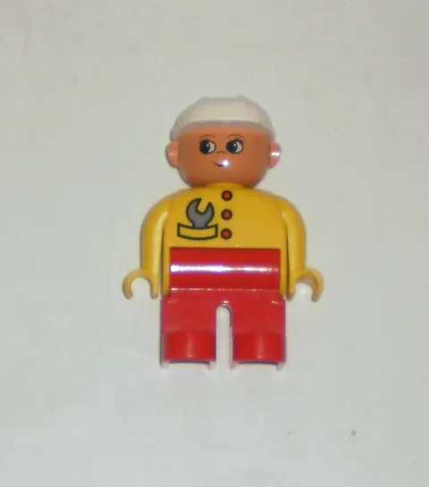 Lego DUPLO Female Figure w/Red Legs, Yellow Top, White Hat and Wrench 4555pb077