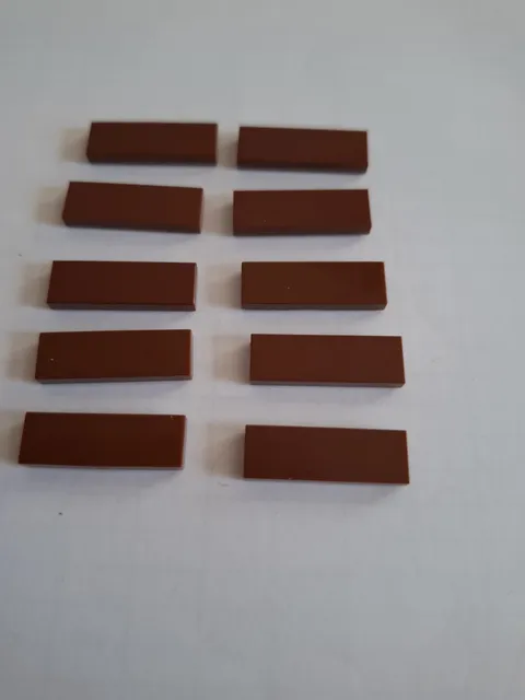 No 334.  lego tile 1x3.   63864 Brown
