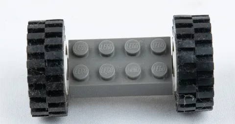 Vintage LEGO Gray 2x6 Brick with Black Treaded Wheels – Original Parts
