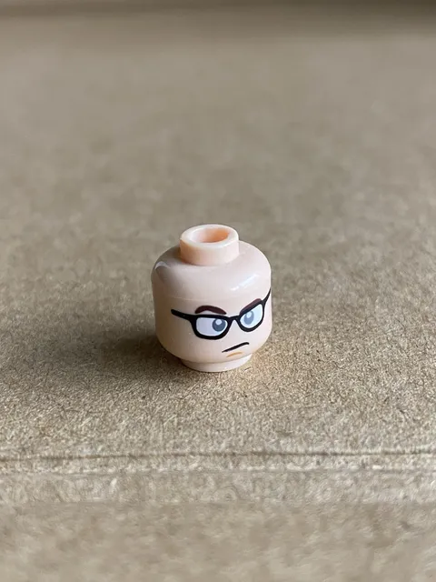 LEGO - Minifigure Head with Black Glasses / White Lenses, Brown Eyebrows - Flesh