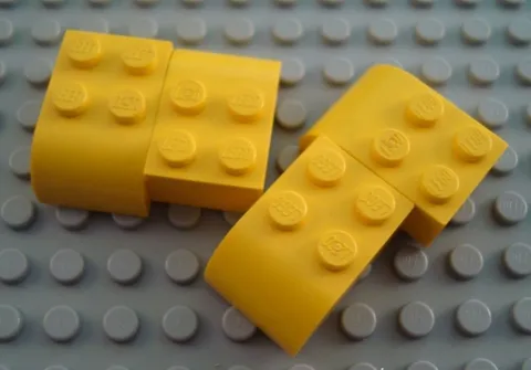 LEGO Lot of 4 Yellow 3x2 Curved Foot Brick Parts