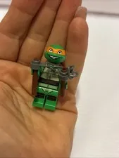 LEGO Michelangelo Grin minifigure TMNT LEGO & The Kraang with Lime Green Eyes
