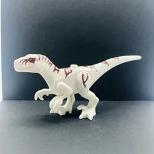 Lego White Dinosaur Atrociraptor with Reddish Brown Markings and Red Eyes