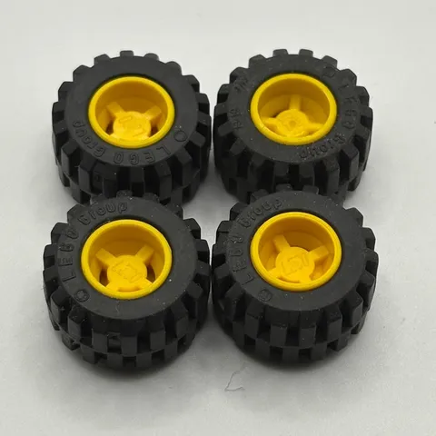 Lego Parts 6014bc05 (4pcs) Yellow - 21mm D. x 12mm Offset Tread.