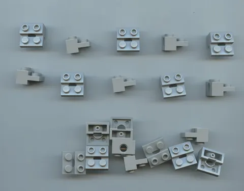 LEGO x 20 Light Bluish Gray Technic, Brick Modified 1 x 2 Hole and 1 x 2 Plate