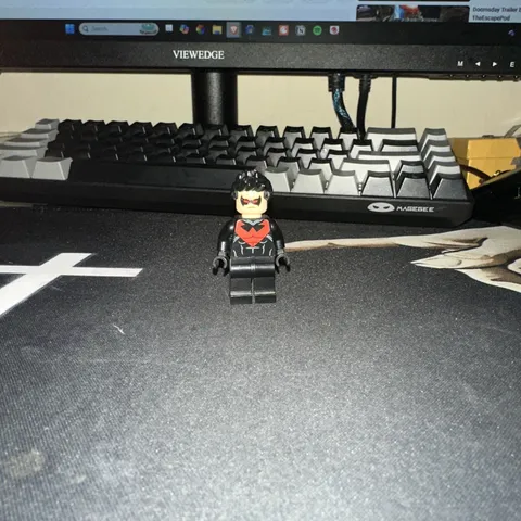 LEGO Nightwing Minifigure Black Suit Red Chest Emblem Masked Face Black Hair