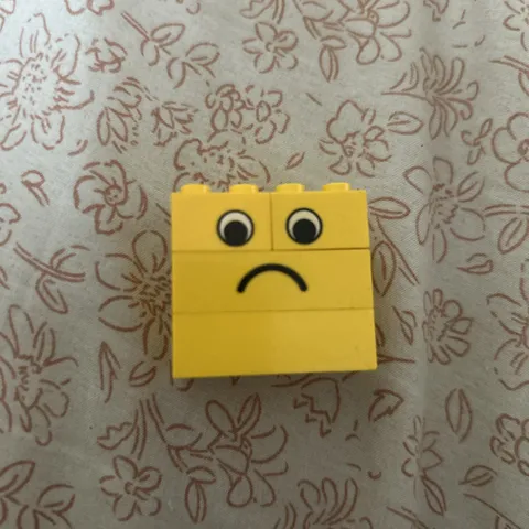 LEGO One Item Using 4 Yellow Brick. Happy On One Side, Sad On The Other