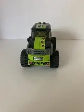 Lego monster truck with Lego man and direction booklet