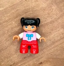 LEGO DUPLO Girl Figure with Black Hair Pigtails Pink Shirt & Red Pants
