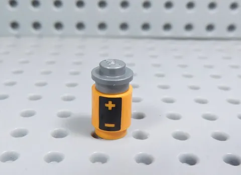 LEGO Orange Printed Round 1x1 Brick Battery Minifig AY