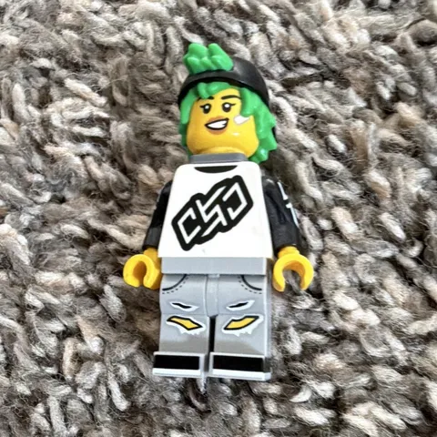 LEGO Minifigure Green Hair, Black Cap, White/Black Torso, Gray Legs, 2-Face Head