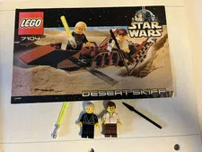 LEGO Star Wars Han Solo (sw0015) and Like Skywalker (sw0020) + Desert Skiff Book