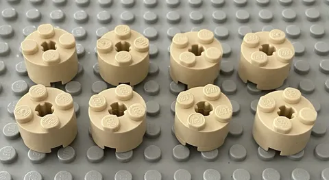 LEGO Tan 2x2 Round Brick With Axle Hole