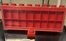 Red Lego display case with 16 compartments