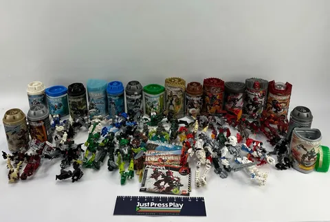 Huge Lot of Lego Bionicle 28+ Figures w/ Some Canisters & Manuals Look!