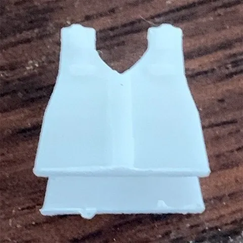 White 3D printed army vest. Compatible with Lego figurines.