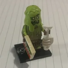 LEGO Green Zombie Monster Minifigure w/ Newspaper Tile, White Accessory, Stand
