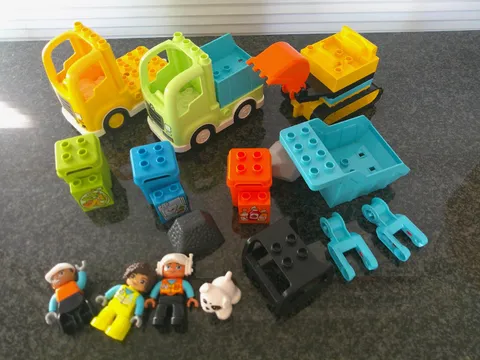 Large Lot of Duplo Trucks, Drivers and Accessories