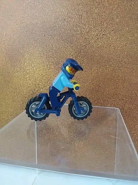 LEGO City Police Bicycle Training set (30638), featuring a blue police...
