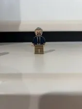 LEGO Minifigure Gray Hair & Beard, Dark Blue Jacket, Tan Legs, 1 Piece
