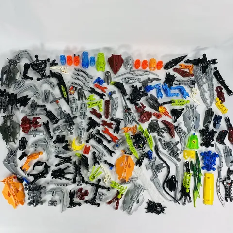 LEGO Lot of 1 lb 6 oz of Random Mixed Bionicle / Hero Parts & Pieces Weapons