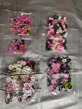 4 SEALED BAGS of Legos Green Pink Purple Cream