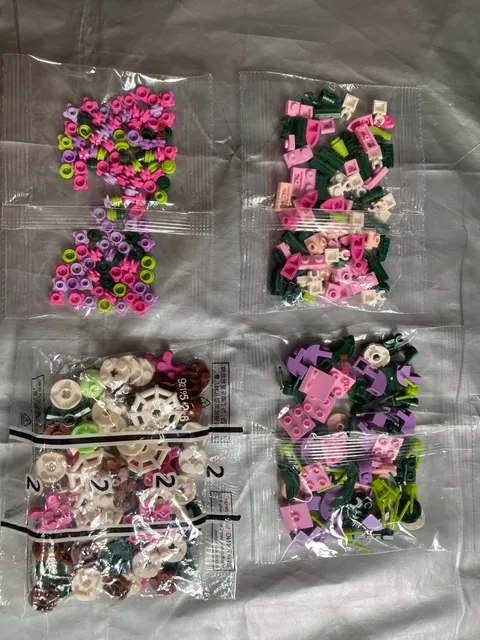 4 SEALED BAGS of Legos Green Pink Purple Cream