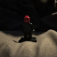 LEGO Plastic Minifigure Black Body w/ Red Head on Black Base Figure