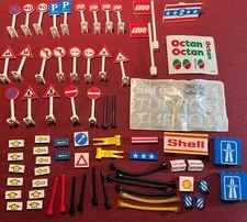 Lego lot of 70+ assorted road signs, posts, misc signs, hoses, stickers, etc.