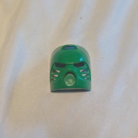 LEGO Bionicle Kanohi Hau mask, Green