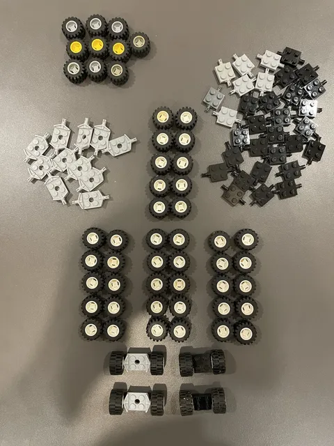 Lego 29 SETS  TIRES 6015/60700/87697,  RIMS 6014,  35 AXLES 160 PIECES