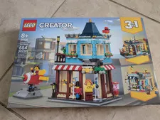 LEGO CREATOR Townhouse Toy Store airplane flowers corner house 31105 New Sealed