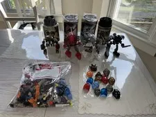LEGO Bionicle Canister Lot Set of 4 Containers, 14 Masks, Extra Pieces Read Desc